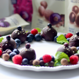 NOiR 58% Organic Dark Chocolate Rolled Blackcurrants 90g